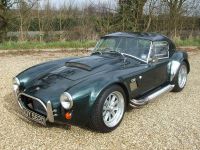 2003 AC, cobra replica
